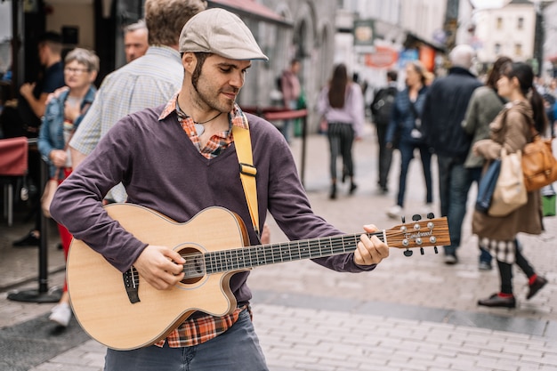 street musician with playing guitar city 138670 57